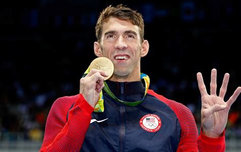 Michael Phelps s 8 zlatými medailami z Pekingu