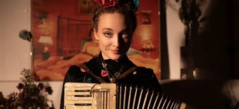 fotografia Michala Krihu s harmonikou