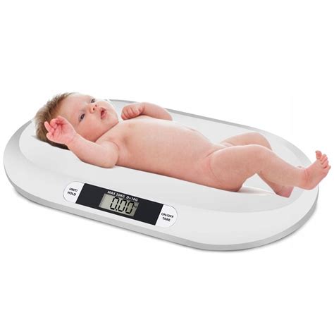 Detská elektronická váha s dieťaťom položeným na plošine.