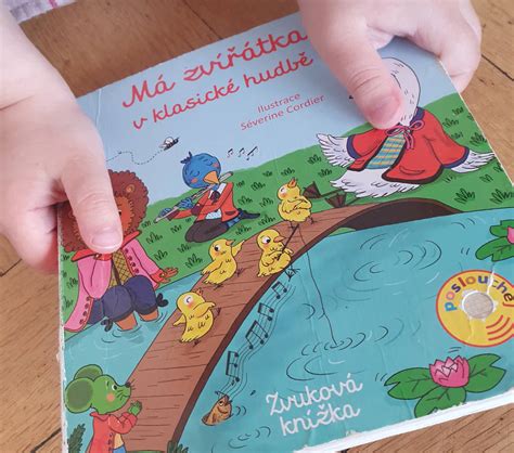 Ilustrovaná obálka knižky s motívom narodenia Ježiška a rôznymi dotykovými prvkami.