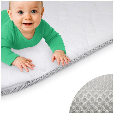 Ilustračná fotografia cestovnej postieľky Hauck v ružovej farbe