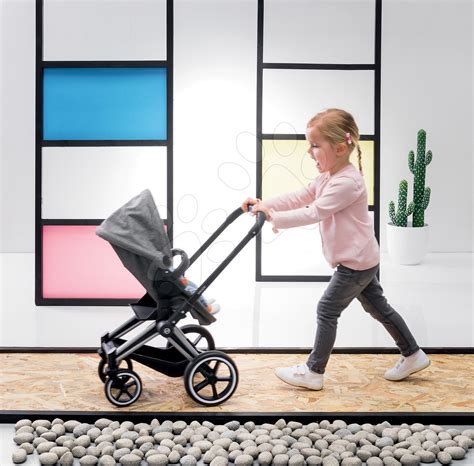 Detail kočíka Cybex Landau 3in1 Priam Corolle s bábikou